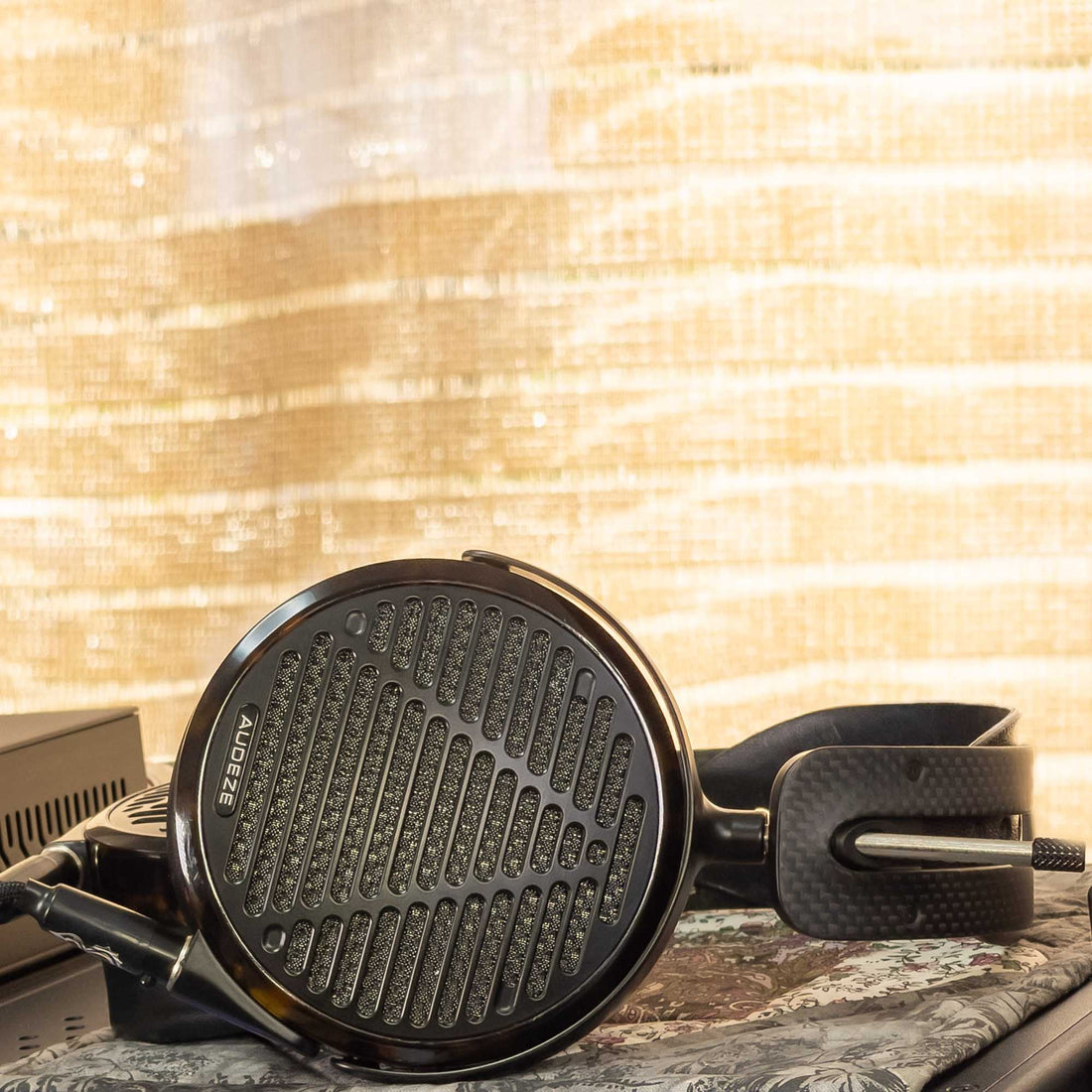 Audeze LCD-5 headphone with sunny pattern background