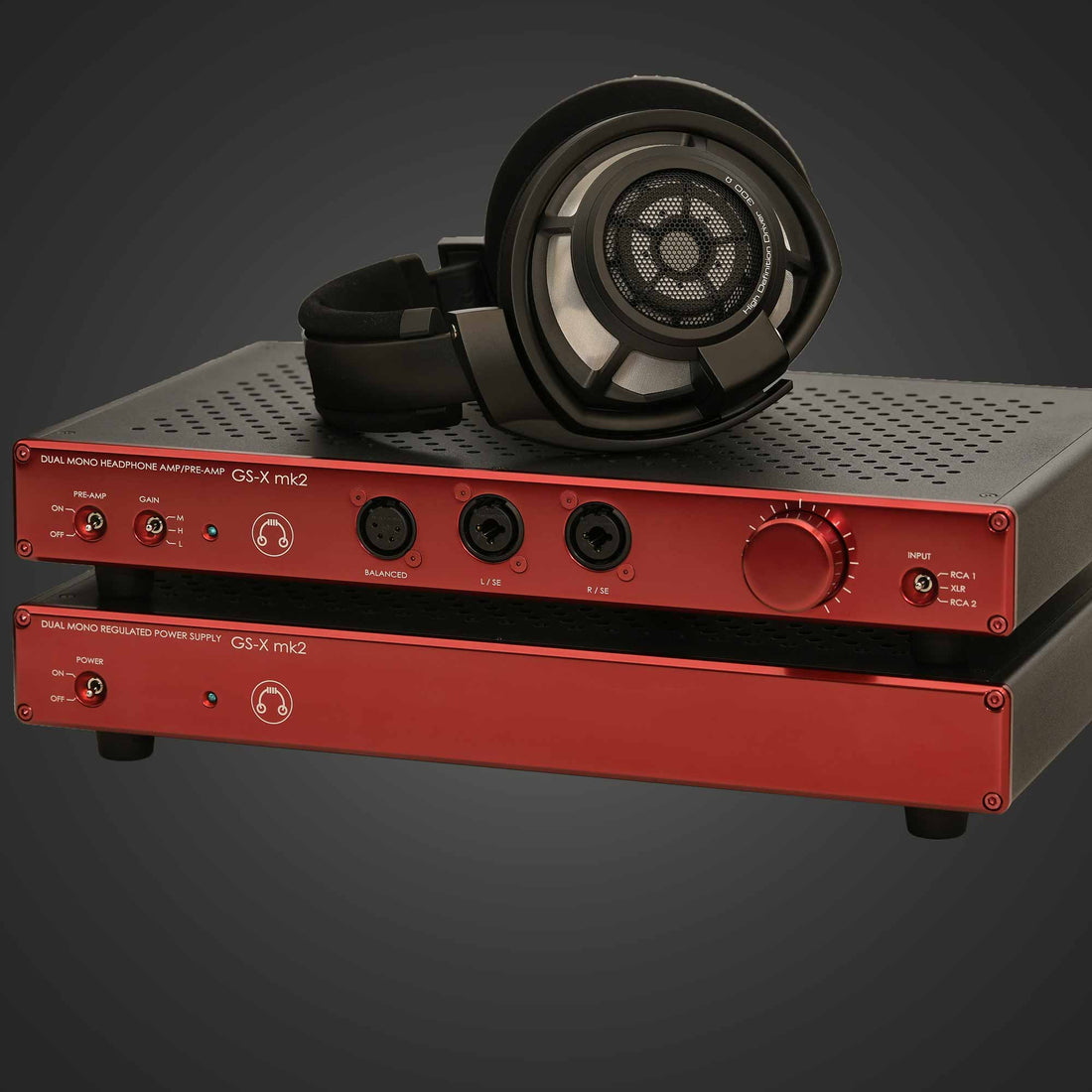 HeadAmp GS-X mk2 headphone amp in red with Sennheiser HD800S sitting on top