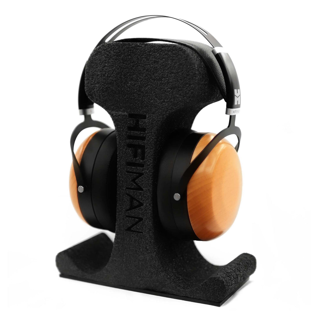 HIFIMAN Sundara closed back with blonde wood ear cups resting on a foam headphone stand