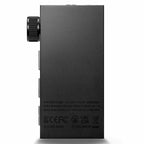 Rear view of Astell&Kern AK HB1 Hi-Fi USB DAC showing volume knob and certification labels on black surface