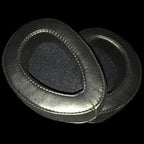 Pair of black Dan Clark Audio AEON Perforated Replacement Ear Pads shown on black background close-up view