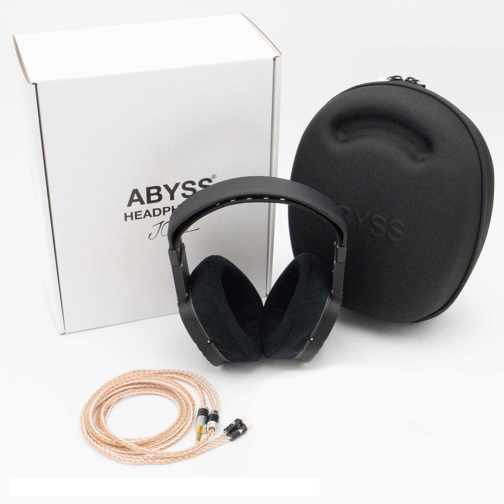 Abyss JOAL High Performance Planar Headphone with carrying case, braided cable, and white branded box on white background