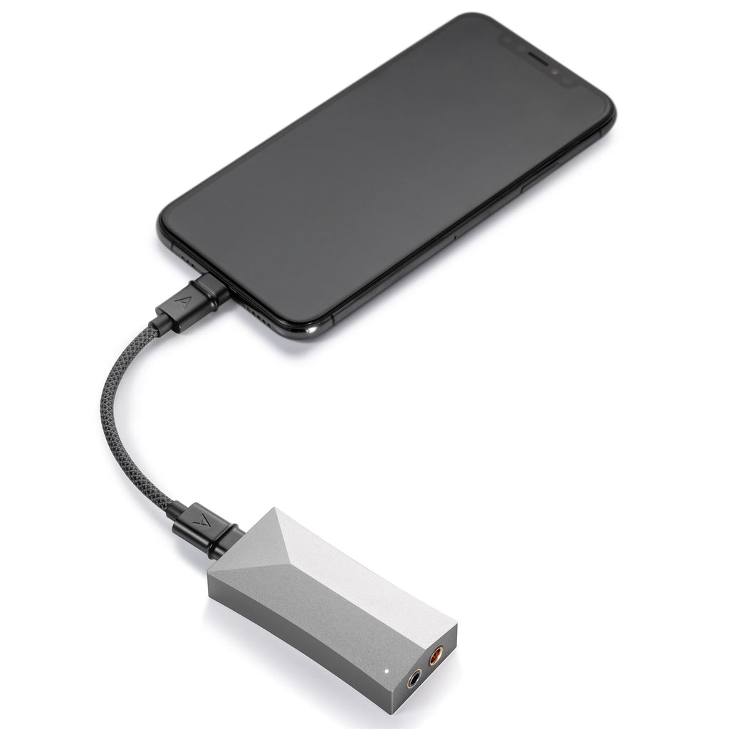 Astell&Kern AK HC4 Hi-Fi USB DAC connected to a smartphone with braided cable on white background