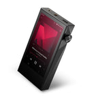 Astell&Kern A&ultima SP3000M Digital Audio Player showing music playback on touchscreen with dual headphone jacks