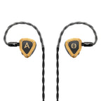 Astell&Kern / Empire Ears NOVUS In-Ear Monitor with gold and black design and braided black cables on white background