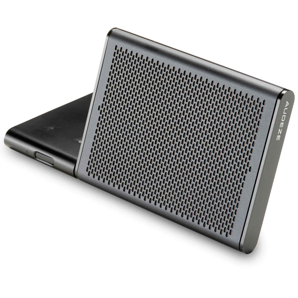 Audeze FILTER Bluetooth Conference Speakerphone angled view showing metal grille and compact slim design on white background