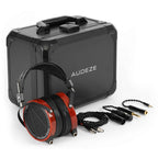 Audeze LCD-2 • Padauk Wood headphones with detachable cables and black carrying case on white background