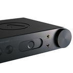 Close-up of the Austrian Audio FULL SCORE ONE Headphone Amplifier showing volume knob and headphone jacks on black casing