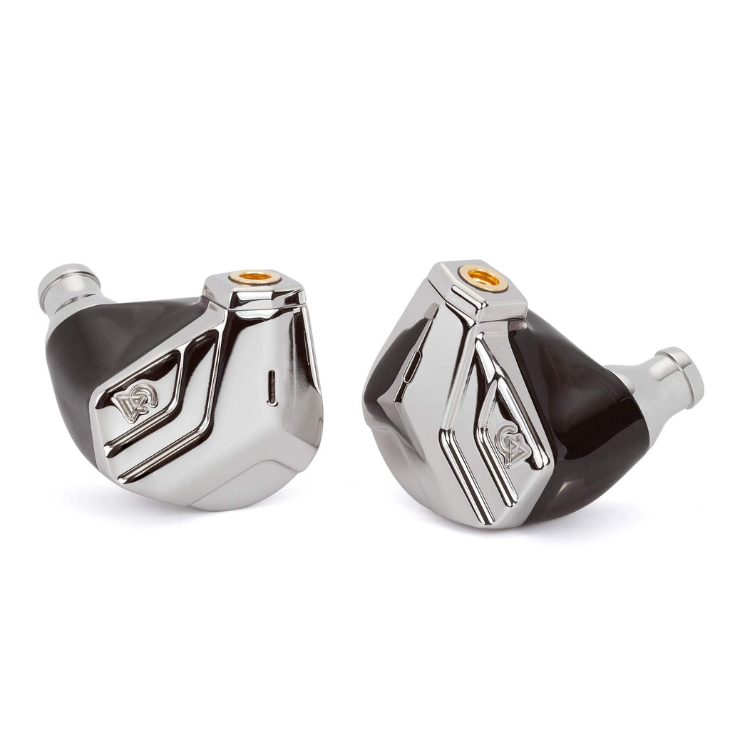 Close-up of the Campfire Astrolith Dual Planar IEM with polished metal faceplates and black shell on white background