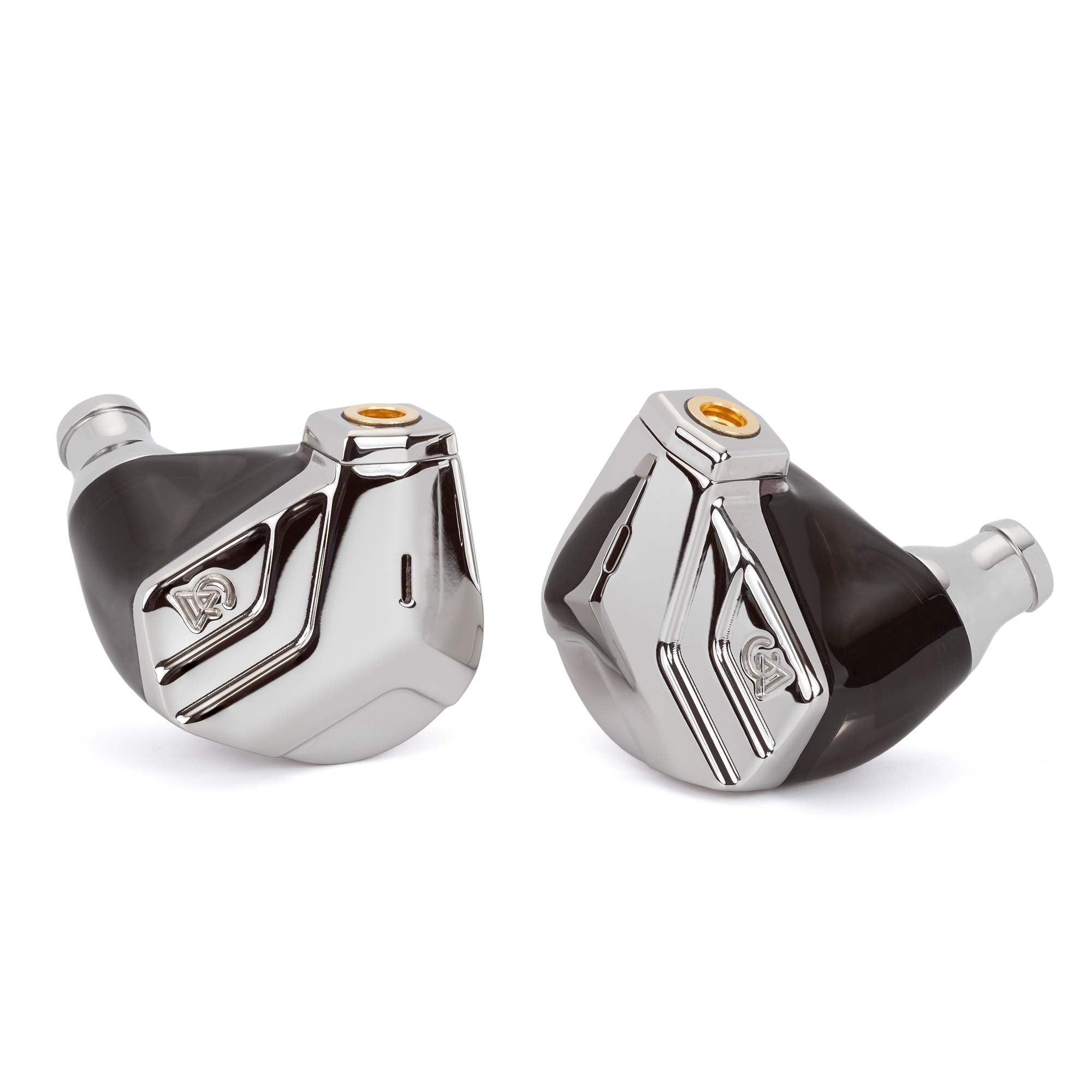 Close-up of the Campfire Astrolith Dual Planar IEM with polished metal faceplates and black shell on white background
