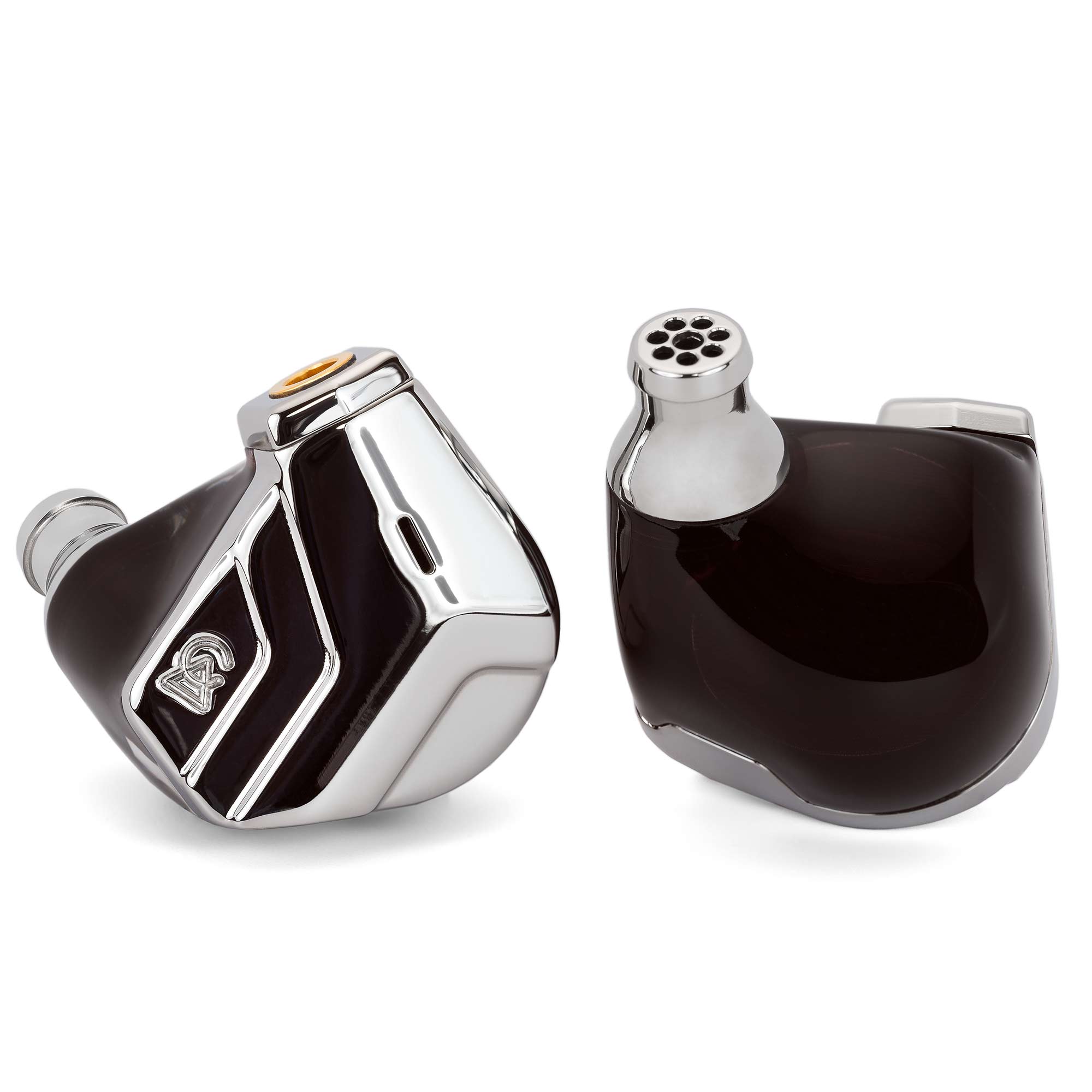 Close-up of Campfire Astrolith Dual Planar IEM with polished metal faceplate and black body on white background