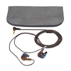 Campfire Moon Rover Limited Edition IEM with braided cable and textured gray carrying case on white background