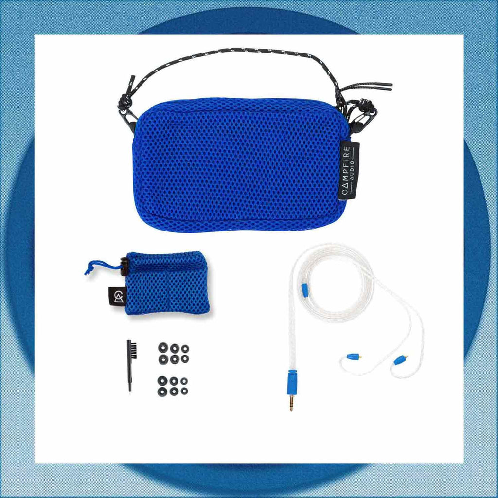 Accessories for Campfire Cascara in-ear monitors including blue carrying cases, white cable, black cleaning brush, and ear tips on white background