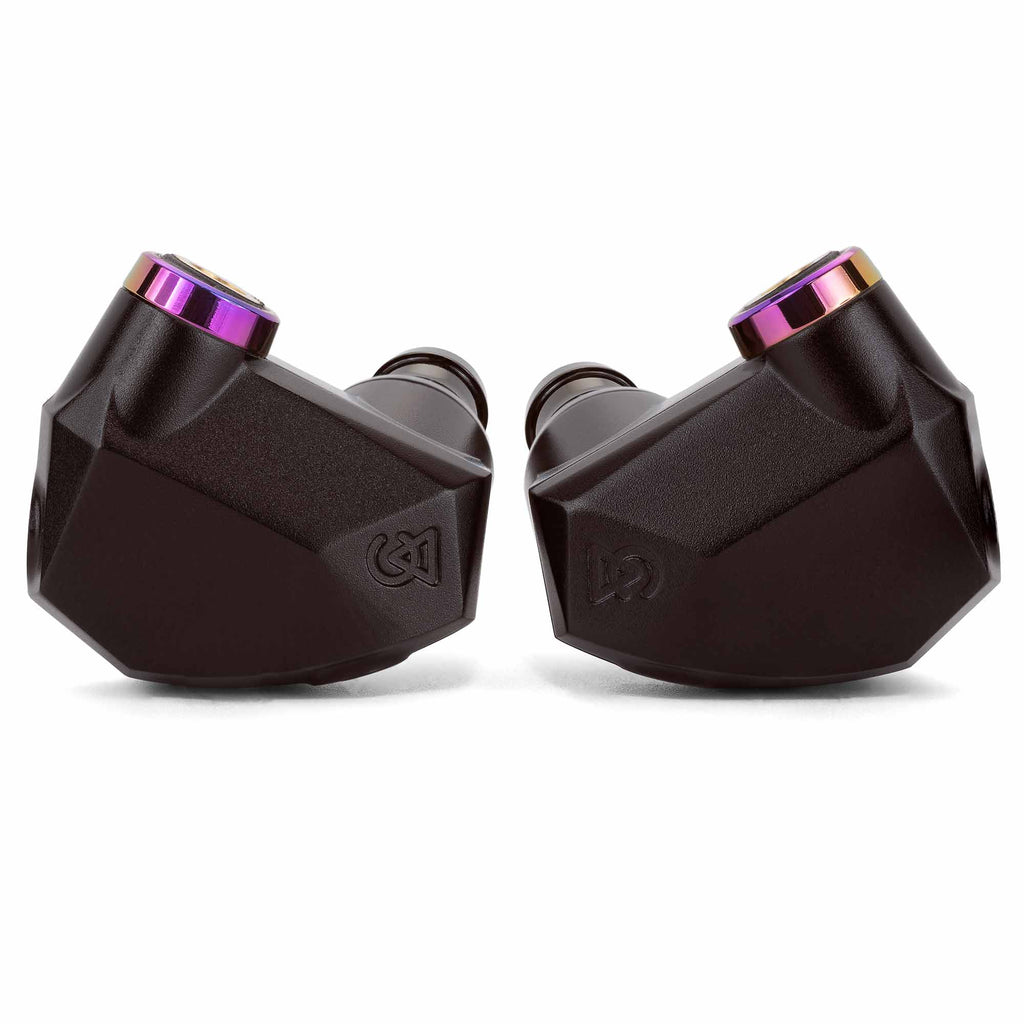 Close-up of black Campfire Fathom in ear monitors with purple accents and geometric design on white background