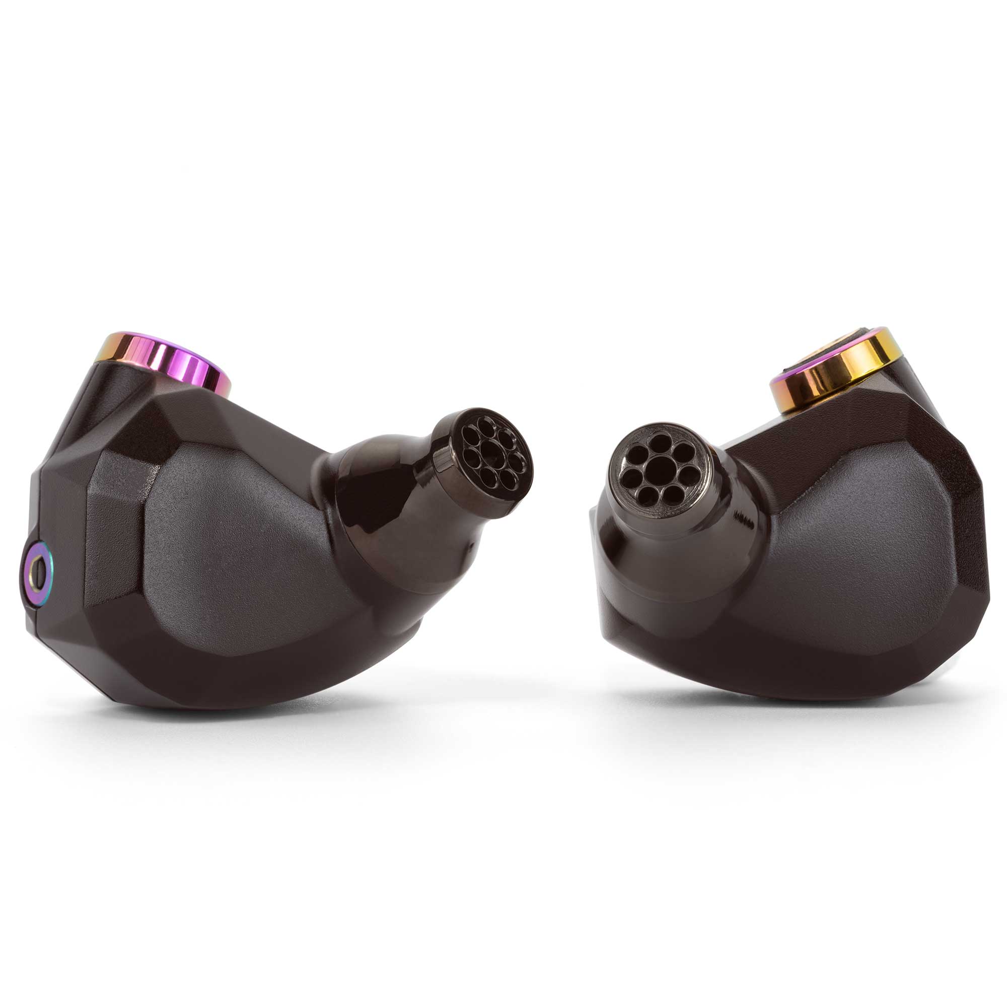 Close-up of Campfire Fathom in ear monitors showing black housing with multitone metallic accents on white background