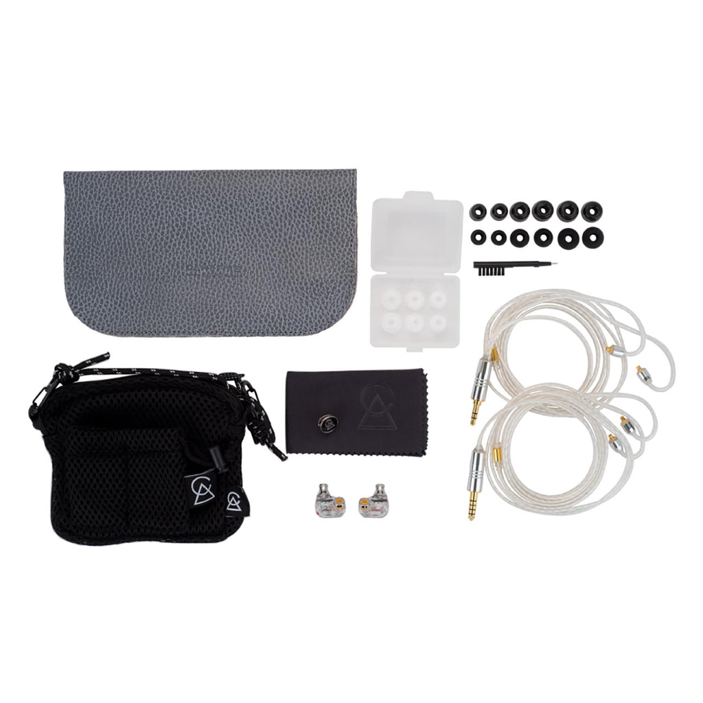 Campfire Iris Hybrid IEM with clear cables, ear tips, cleaning tool, black carrying pouch, and gray storage case on white background