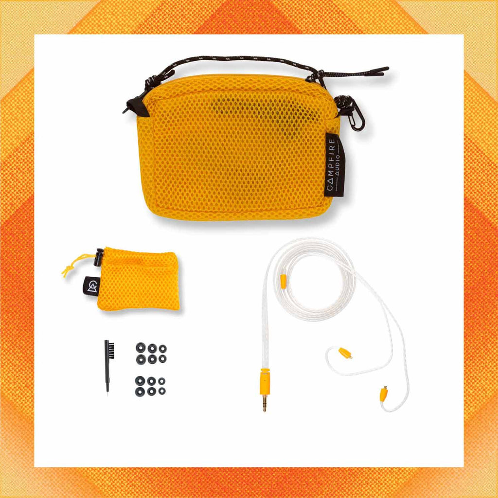 Campfire Supermoon accessories including yellow mesh carrying case, cable, ear tips, and cleaning tool on white background