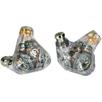 Close-up of Campfire Trifecta 'Chrome Sky' - Flagship IEM with transparent housing showing triple dynamic drivers