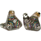 Campfire Trifecta 'Dark Prism' - Flagship IEM showing transparent shell with colorful internal components and metal nozzles