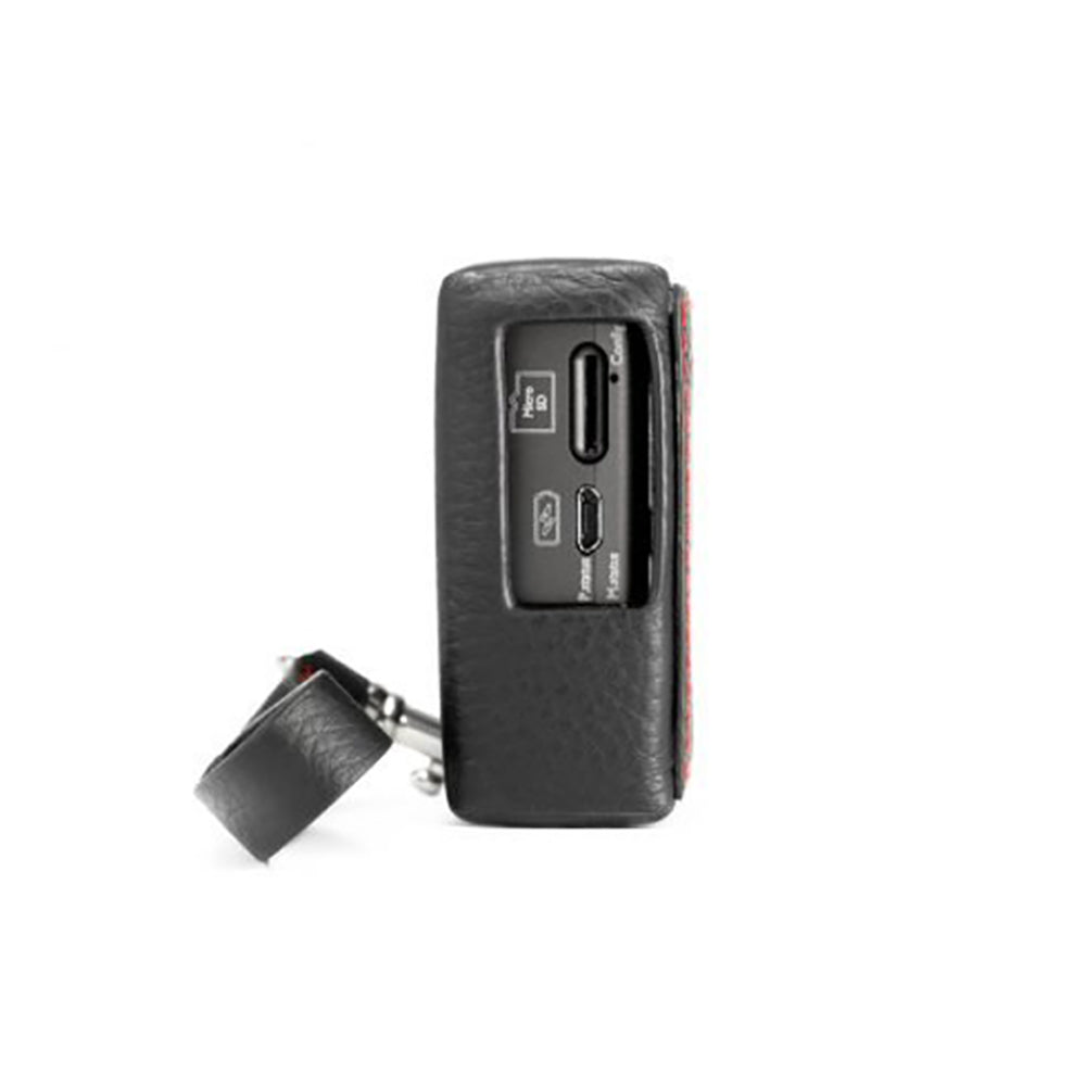 Side view of Chord Mojo 2 / Poly Premium Leather Case showing port openings and attached leather strap on white background