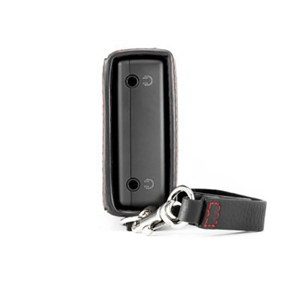 Side view of Chord Mojo 2 / Poly Premium Leather Case showing headphone jacks and detachable strap on white background