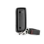 Side view of Chord Mojo 2 / Poly Premium Leather Case showing headphone jacks and detachable strap on white background