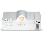 Front view of the silver Chord Suzi Modular Stereo Power Amplifier with control buttons and volume knob illuminated