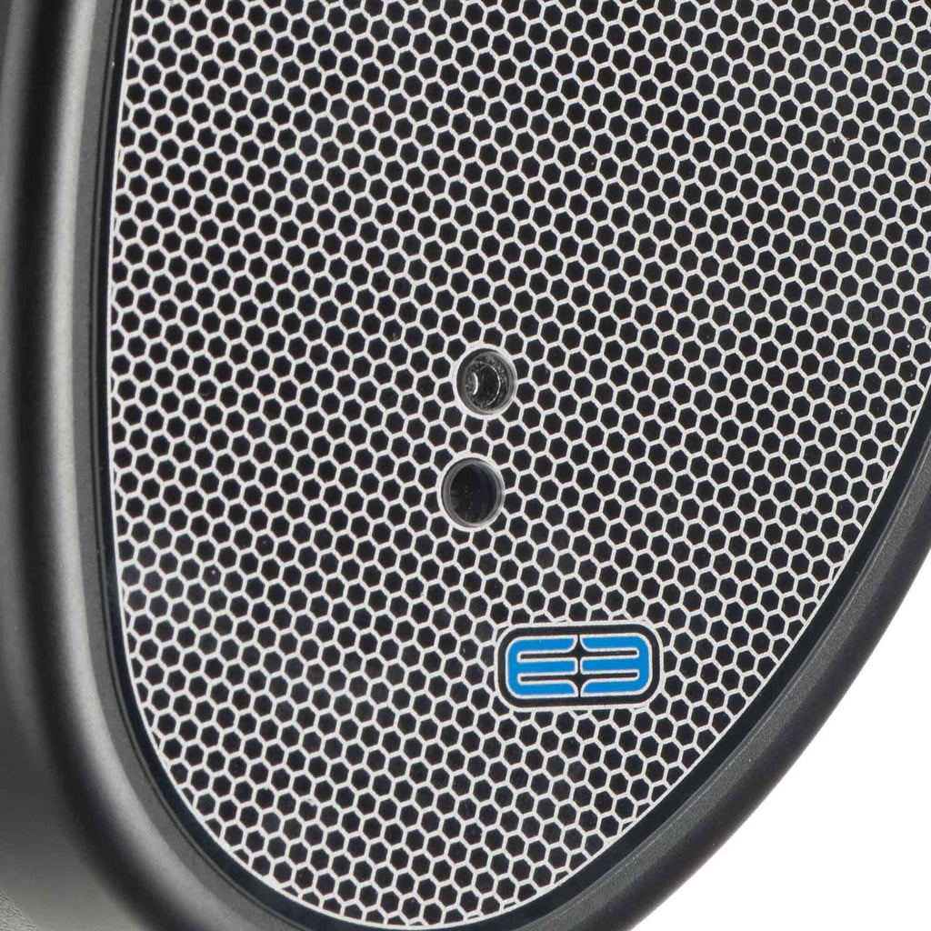 Close-up of the Dan Clark Audio E3 Closed Planar Headphones showing the textured metal grille with logo detail.