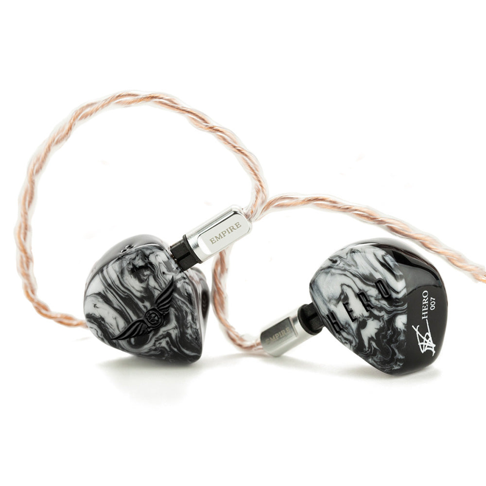 Empire Ears Hero in-ear monitors with black and white marbled shells and braided copper cable on white background
