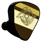 Close-up of Empire Ears RAVEN Flagship In-Ear Monitor with reflective gold faceplate and intricate design on white background
