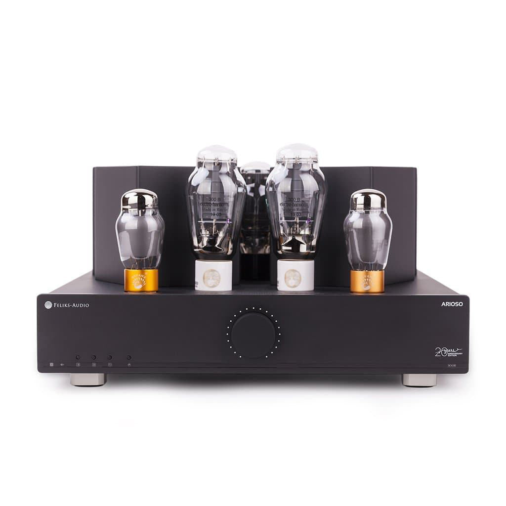 Front view of Feliks Audio Arioso 300B Integrated Tube Amplifier with four vacuum tubes and black chassis on white background