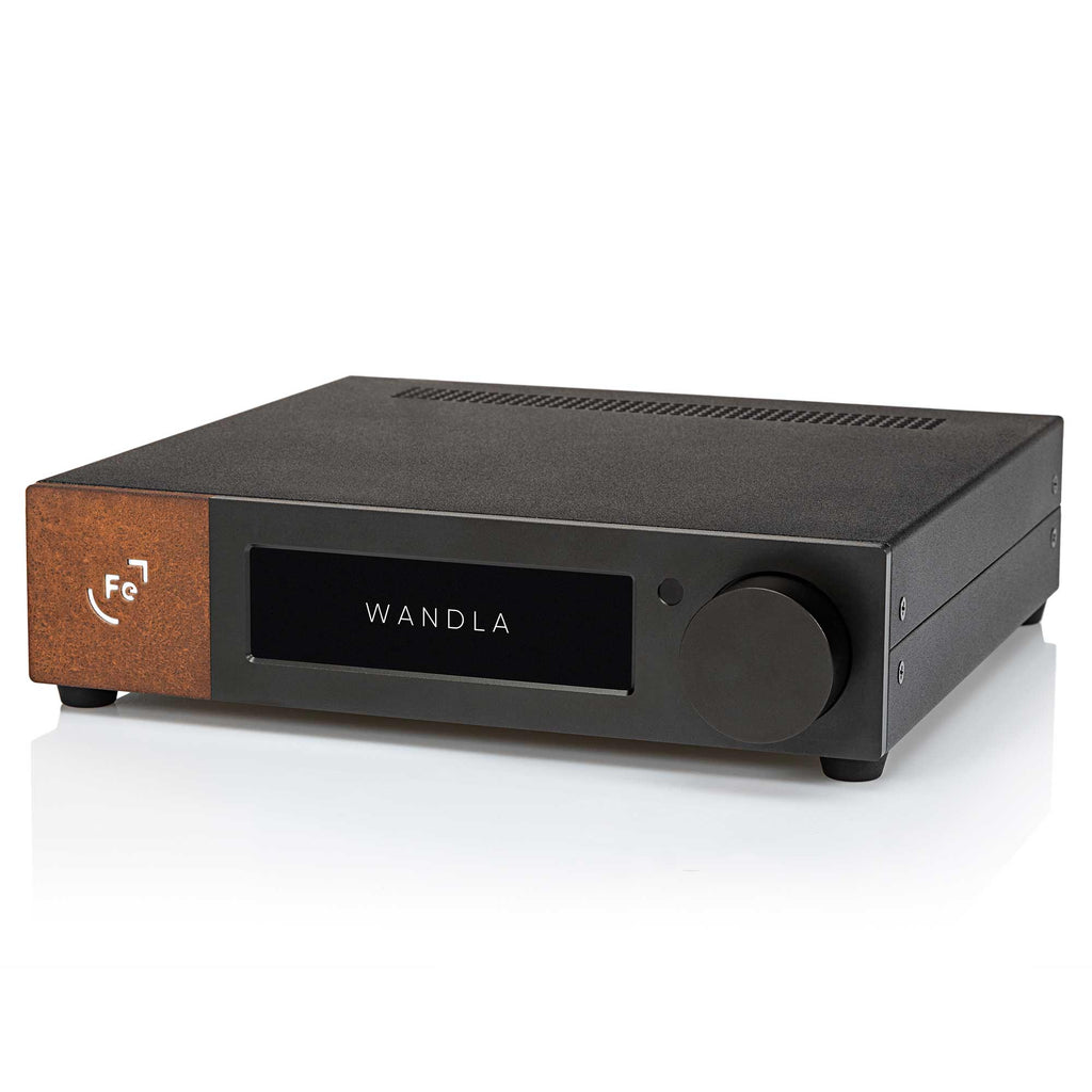 Ferrum WANDLA DAC/Pre-Amp in black with wood accent, digital display, and large control knob on white background
