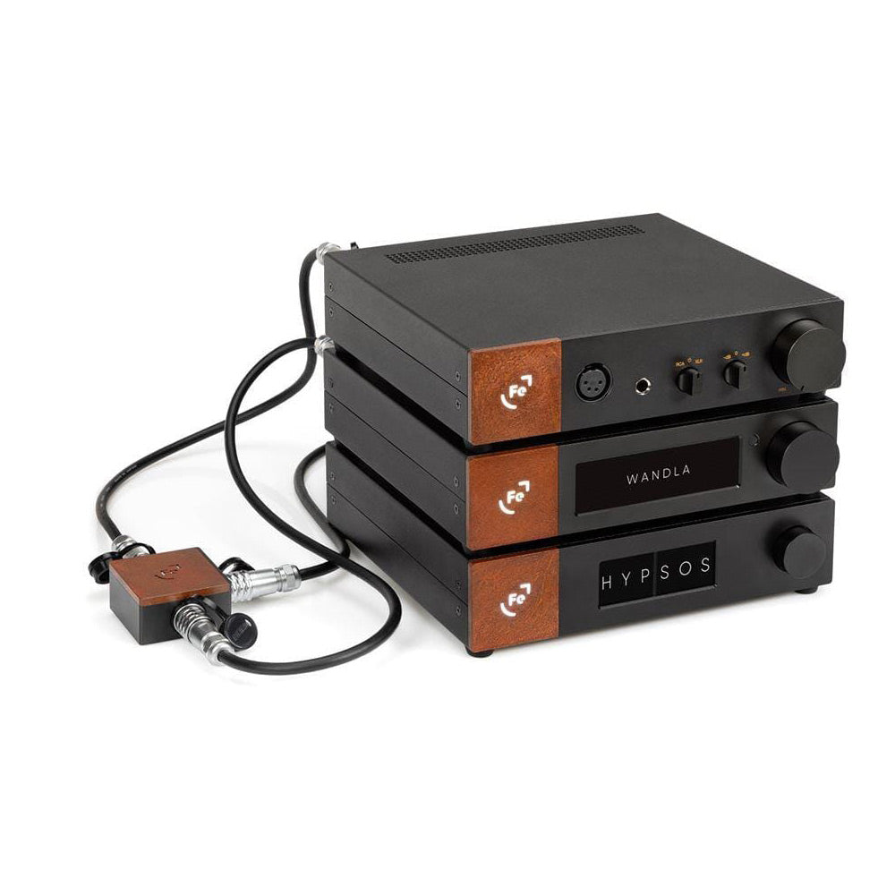Ferrum HYPSOS Dedicated Power Supply stacked with audio components and connected cables on white background