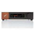 Front view of Ferrum WANDLA DAC/Pre-Amp showing display with audio settings and wooden side panel on white background