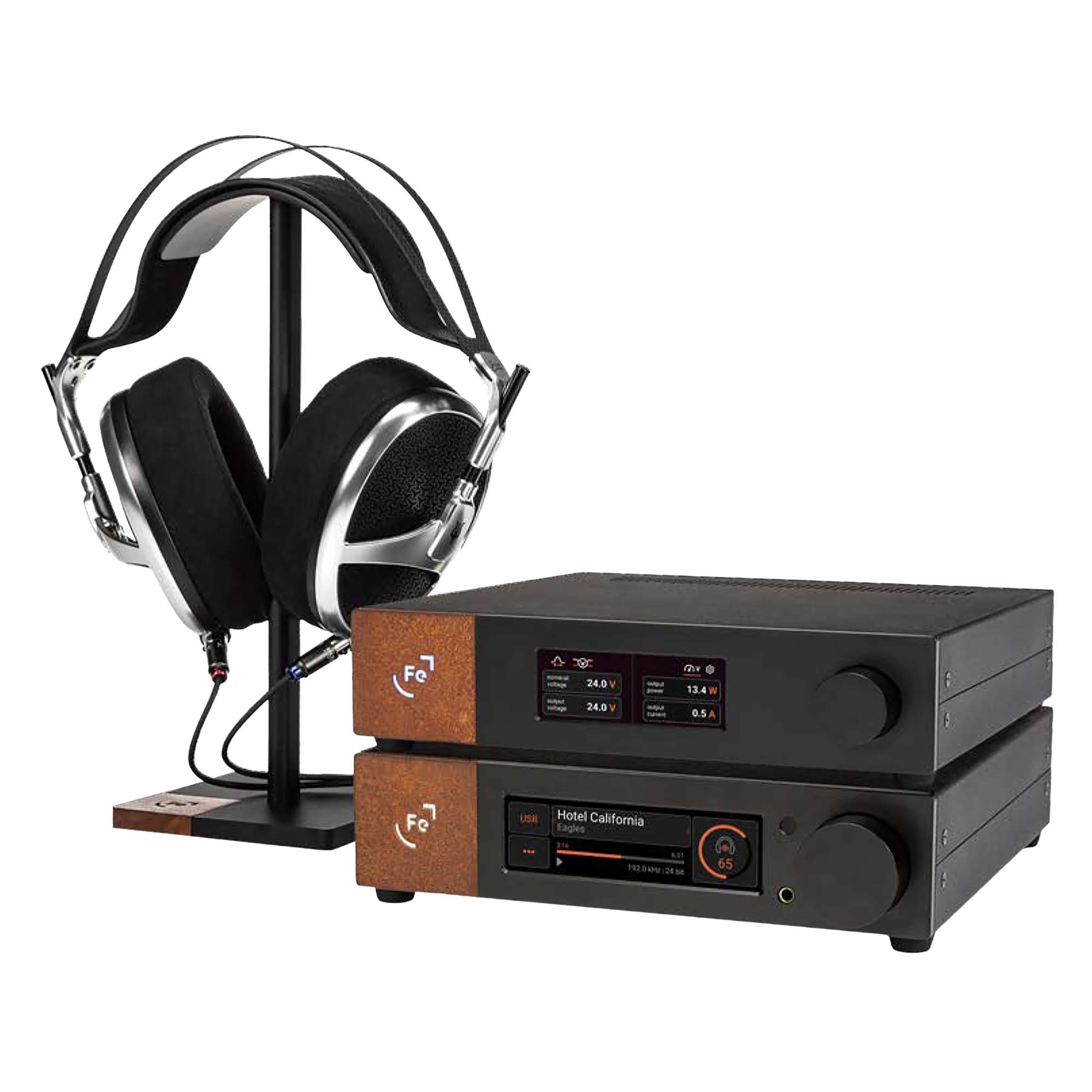 Ferrum WANDLA 2.0 DAC/Pre-Amp stacked with black and brown accents next to headphones on stand on white background