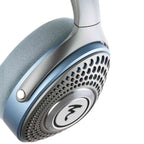 Close-up of Focal Azurys Closed-Back Headphones with silver and blue design highlighting ear cup and mesh details