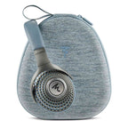 Focal Azurys Closed-Back Headphones resting against a gray textured carrying case with logo on a white background