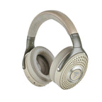 Focal Bathys Wireless Closed-Back Headphones in beige with cushioned ear pads and perforated ear cups on white background