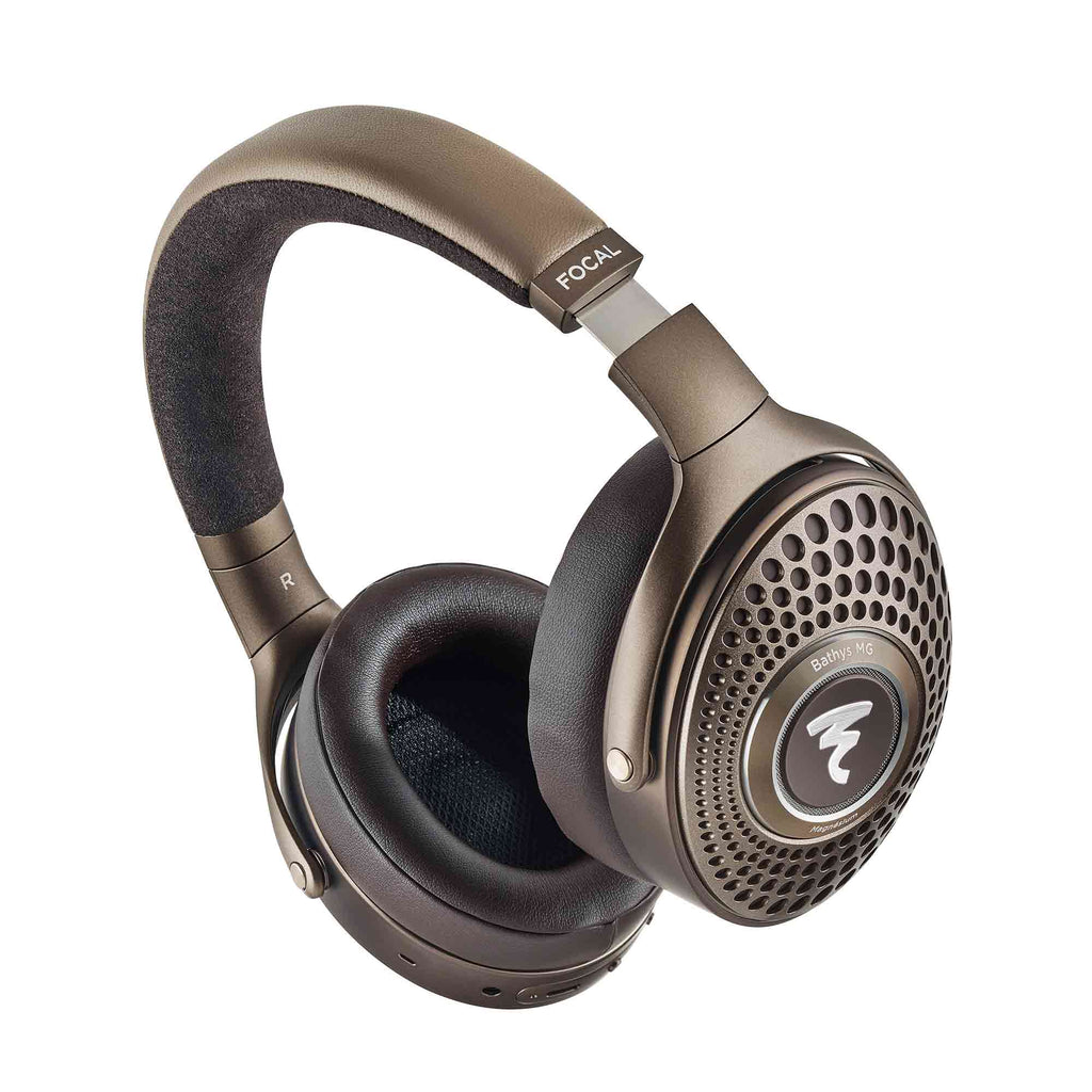 Focal Bathys MG Wireless Noise-Cancelling Headphones in metallic bronze with perforated ear cups and padded headband on white background