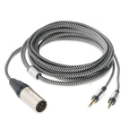 Focal Clear Balanced XLR Cable with woven black and white jacket and silver connectors on white background