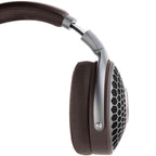 Side view of Focal Hadenys Open-Back Dynamic Headphones with brown ear pads and silver frame on white background