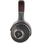 Close-up of Focal Hadenys Open-Back Dynamic Headphones showcasing mesh grille and brown padded headband on white background