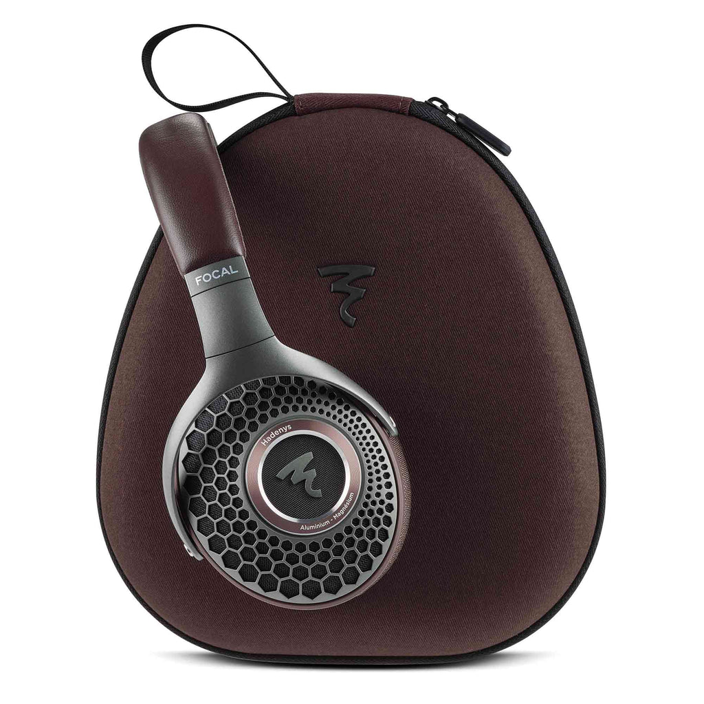 Focal Hadenys Open-Back Dynamic Headphones with honeycomb grille resting on a branded carrying case with zipper closure