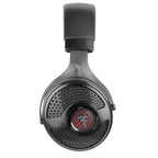 Close-up top view of the black Focal Utopia 2022 open-back headphone ear cup with red speaker detail