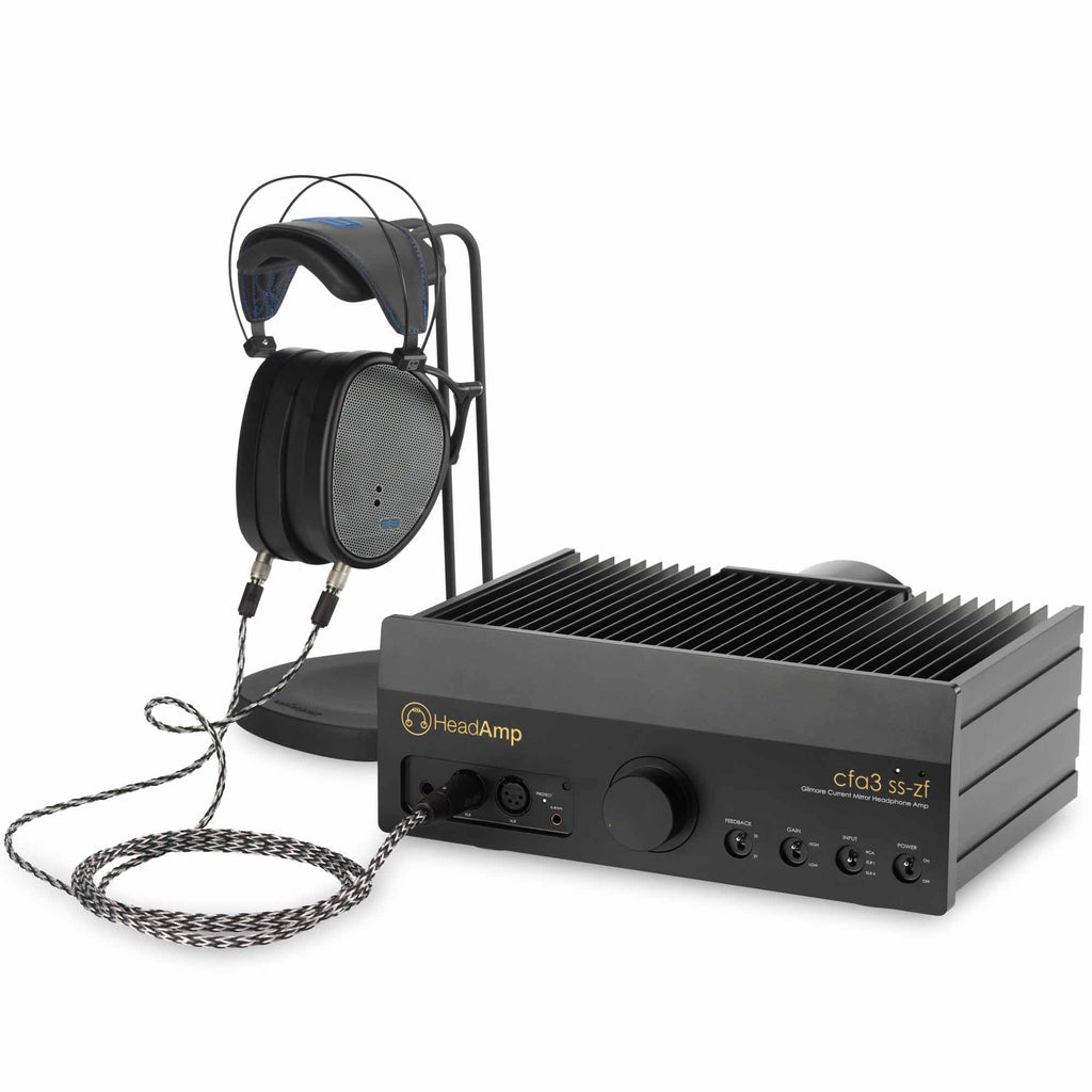 HeadAmp CFA3 Headphone Amp (Pre-Order Deposit) with black planar headphones on metal stand and braided cable on white background