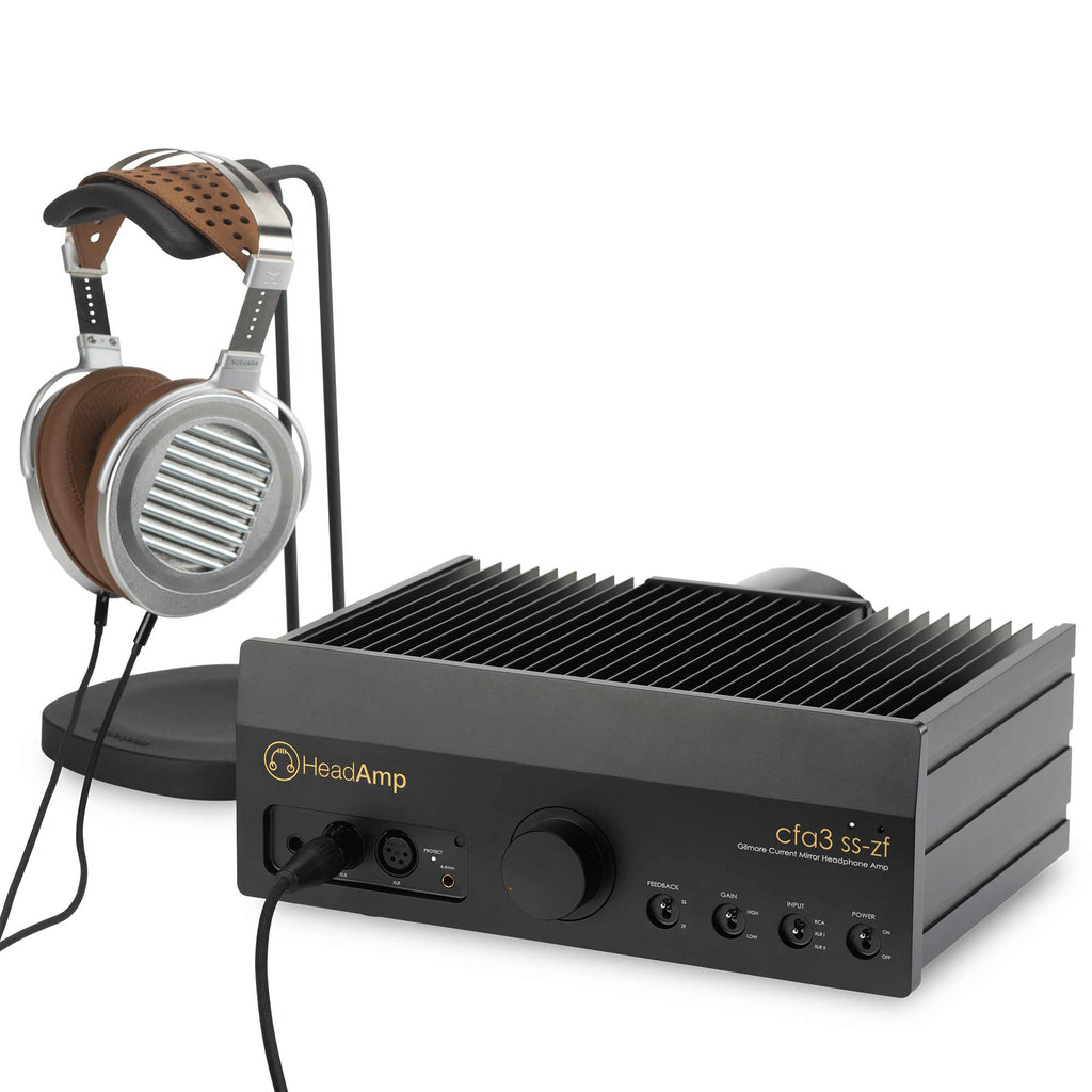 HeadAmp CFA3 Headphone Amp (Pre-Order Deposit) with headphone connected on black surface and metal cooling fins