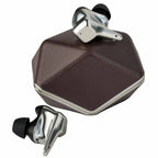 HIFIMAN Svanar Wireless LE In-Ear Monitor earbuds with metallic finish resting on a textured brown charging case