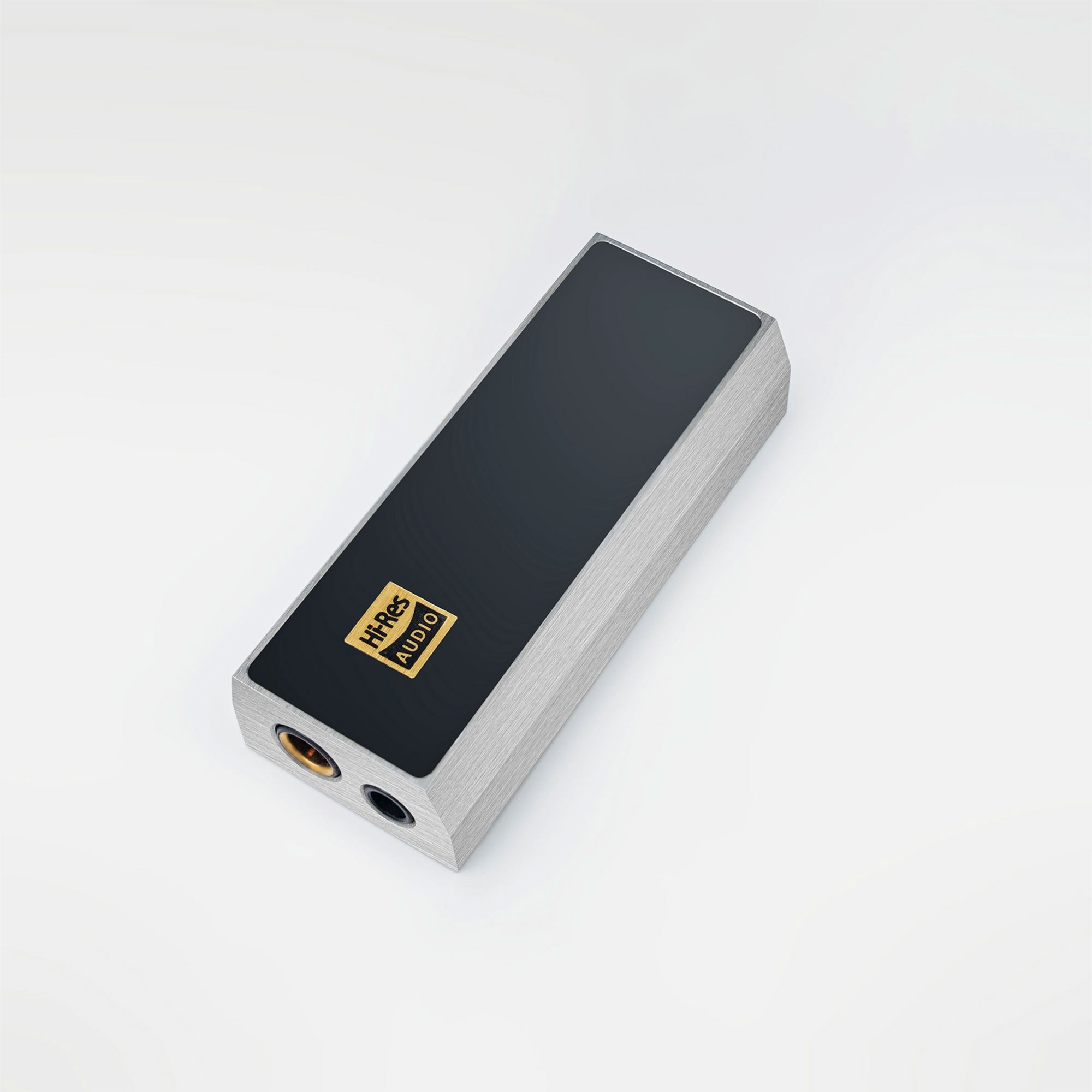 The iBasso DC04Ultra USB DAC/Amp is a rectangular device by iBasso featuring a black top, brushed silver sides, USB-C connectivity, standard and 4.4mm Balanced ports, and a gold Hi-Res AUDIO label on top. Background is plain white.
