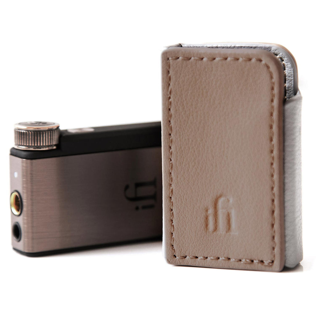 iFi Audio GO blu Case in beige leather standing next to a black and bronze iFi audio device on white background