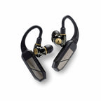 iFi Audio GO Pod Wearable Bluetooth DAC/Amp with black and gold in-ear monitors on white background